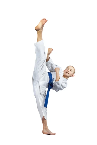 Mavashi geri by an athlete with a blue belt — Stock Photo, Image