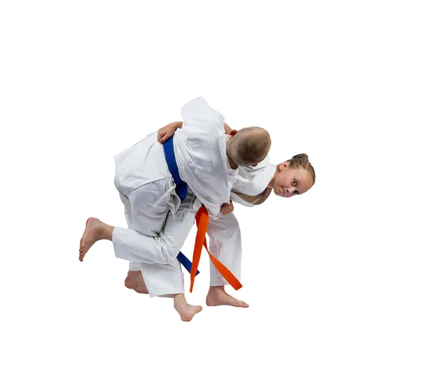 Active sportswoman is doing judo throw — Stock Photo, Image