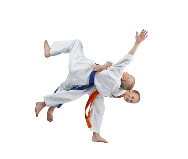 Sportsmens train in judogi judo throws — Stock Photo, Image