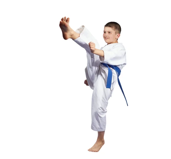 Boy beats kick mae-geri on a white background — Stock Photo, Image