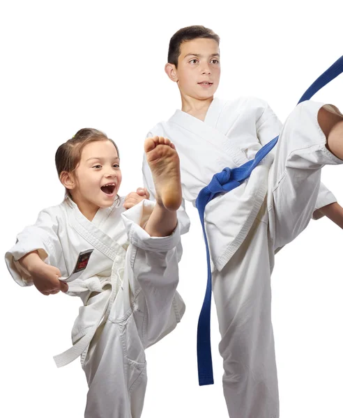 The blow mae-geri beat brother and sister in karategi — Stock Photo, Image