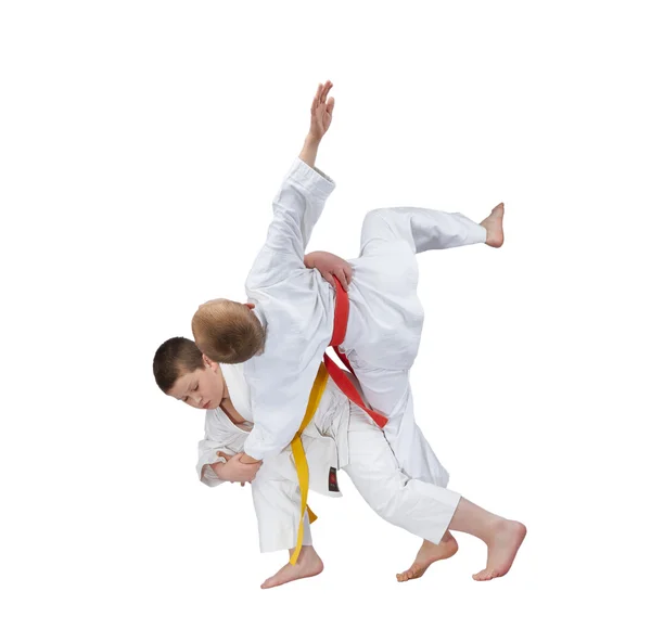 High throw in perfoming athlete with a yellow belt — Stock Photo, Image