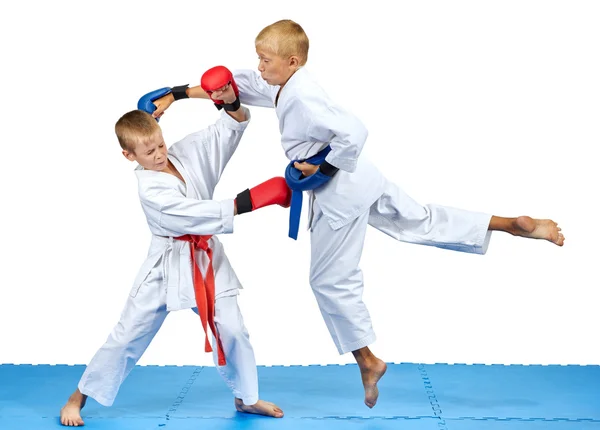 Two athletes train karate blows — Stock Photo, Image