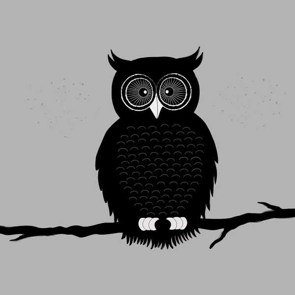 Black owl on branch — Stock Vector