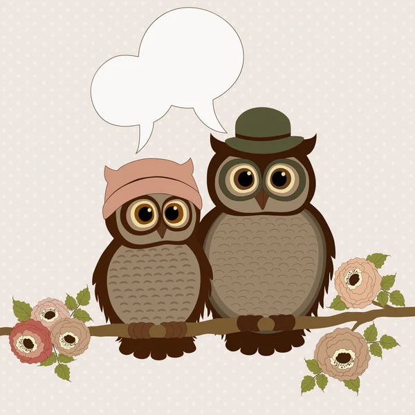 Cute owls on a branch with speech bubble — Stock Vector