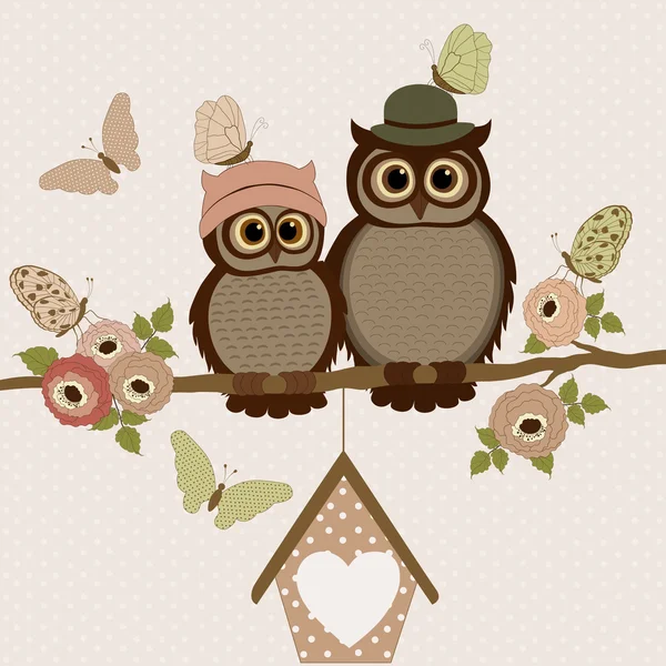 Cute owls on a branch with roses — Stock Vector