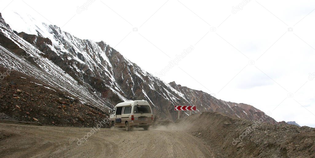 Kyrgyzstan, Southern Coast Of Issyk-Kul Lake, Famous Scenic Barskaun Gorge ( Leopard Tears Or Pass Barskoon ) In Tien-Shan Mountains. Serpentine Road To The Gold Mine Kumtor And Arabel Plateau.