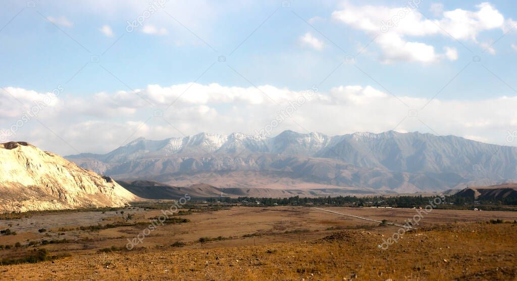 Beautiful mountains in Kyrgyzstan near Kazarman. Beautiful landscape with mountains at Kyrgyzstan on sunny day