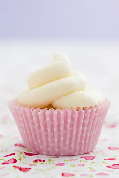 Single vanilla cupcake — Stock Photo, Image