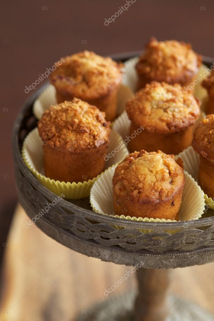 Muffins on cake stand — Stock Photo © ECoelfen 102839236