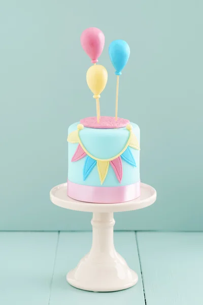 Birthday cake with balloons — Stock Photo, Image