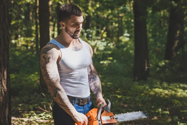 Portrait of aggressive muscular male lumberjack — Stock Photo, Image