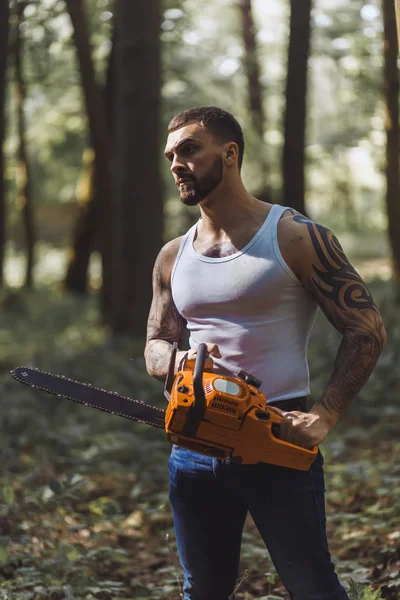 Portrait of aggressive muscular male lumberjack — Stock Photo, Image