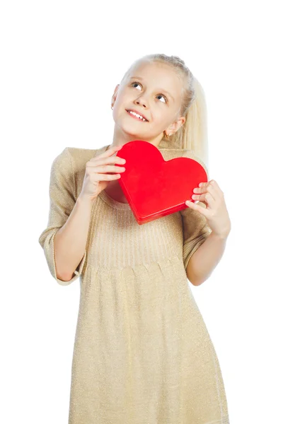 Beautiful girl holding heart in arms. — Stock Photo, Image