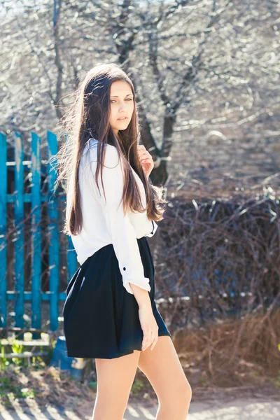 Beautiful girl in skirt — Stock Photo, Image