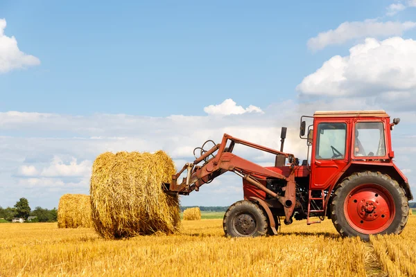 Tractor carrying hay Royalty Free Stock Images