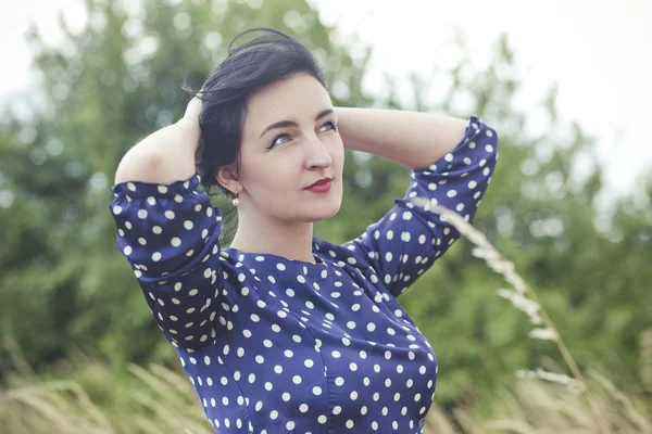 Art portrait of a beautiful brunette — Stock Photo, Image