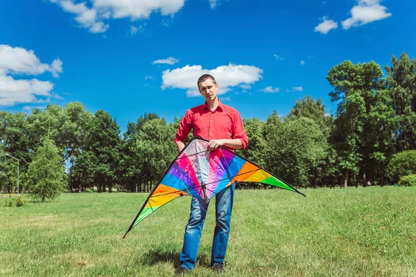 Young man with kite — Stock Photo, Image