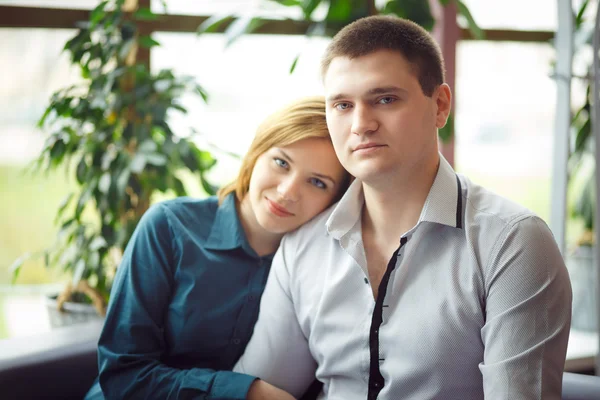 Couple sitting in cafe — Stock Photo, Image