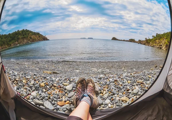 View from inside a tent on the mountains and sky   on the seashore — Stock Photo, Image