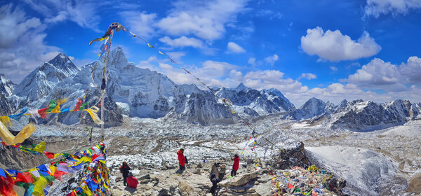 View of Mount Everest and Nuptse  with buddhist prayer flags from kala patthar
