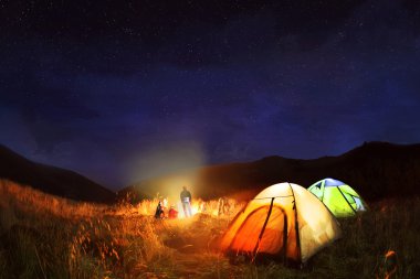 Camping under the stars at night  clipart