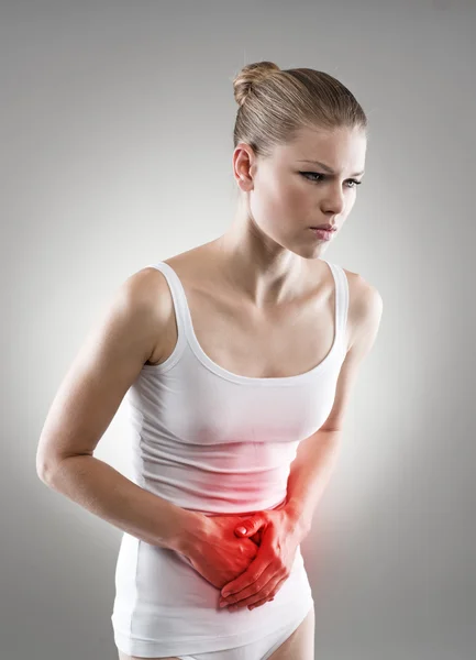 Kvinna med menstruation smärta — Stockfoto