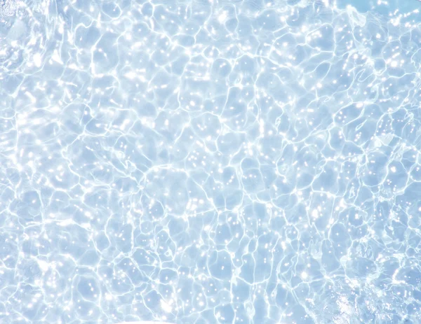 Textura de água azul com ondulação útil como fundo — Fotografia de Stock