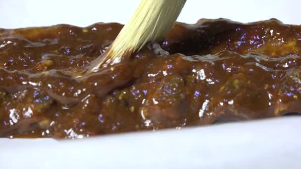 Brushing Barbecue Sauce Ribs Closeup Slow Motion — Stock Video