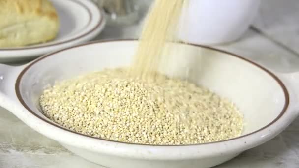 Pouring Quinoa Bowl — Stock Video