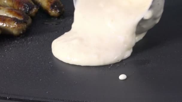 Pouring Pancake Batter Hot Grill Link Sausage — 图库视频影像