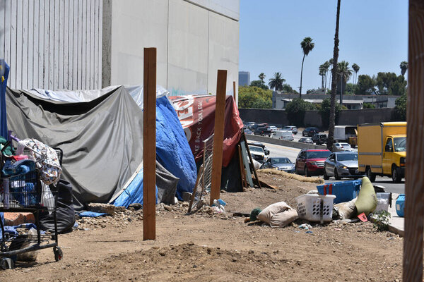 Los Angeles, CA USA - June 30, 2021: Homeless encampment on an off ramp from the Hollywood freeway