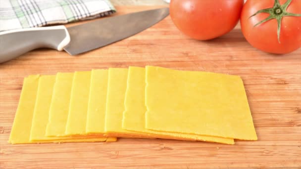 Slices Cheddar Cheese Vanishing Cutting Board Stop Motion Animation — Stock Video
