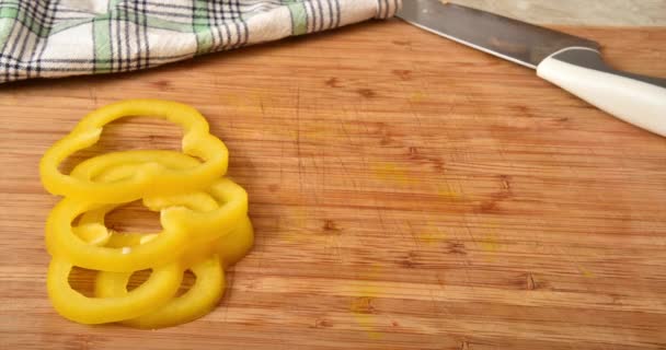 Yellow Red Orange Green Bell Pepper Slices Appearing Cutting Board — Stock Video