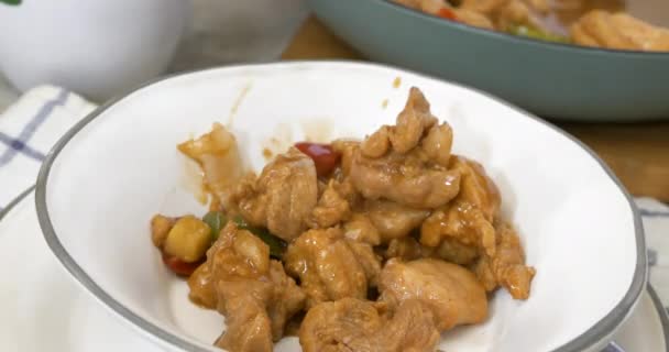 Spooning Kung Pao Chicken Bowl Close — Stock Video