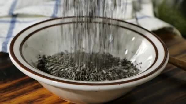 Pouring Black Chia Seeds Small Bowl — Stock Video