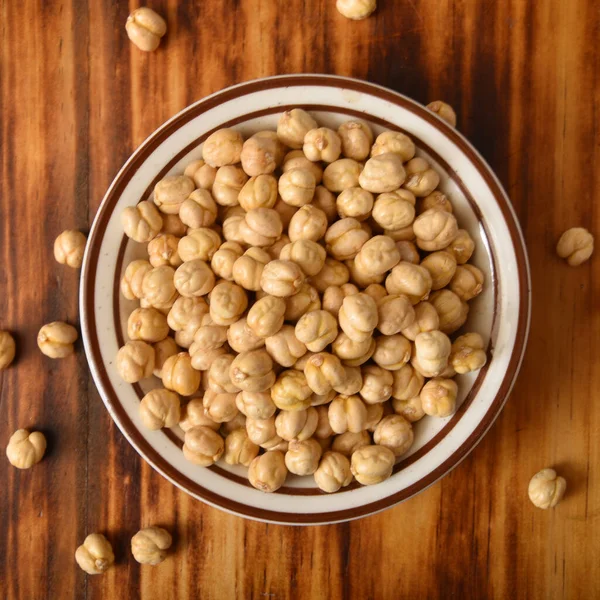 Bowl Roasted Dried Chickpeas Wooden Table Overhead View — Stock Photo, Image