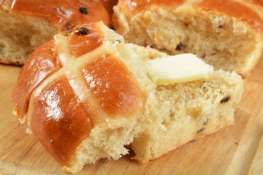 Buttered hot cross bun