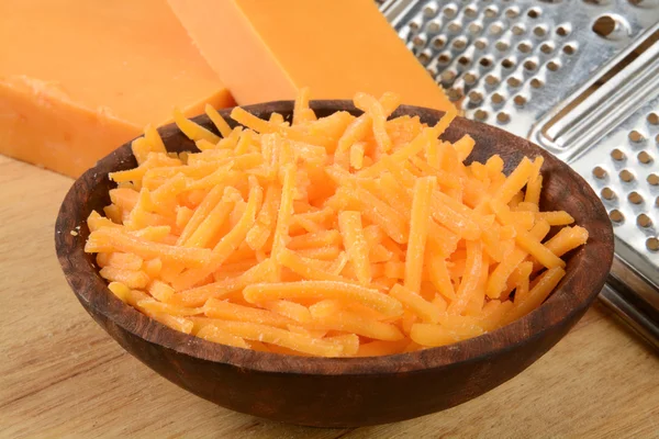 Grated cheddar cheese — Stock Photo, Image