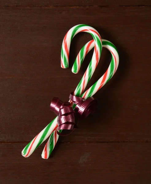 Candy canes in a bow — Stock Photo, Image