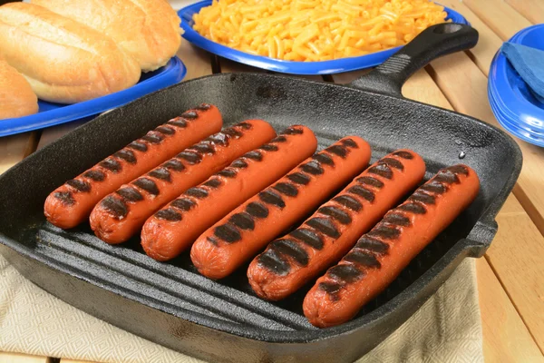 Grilled hot dogs with buns — Stock Photo, Image