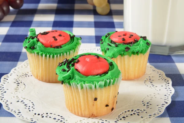 Cute cupcakes and milk — Stock Photo, Image