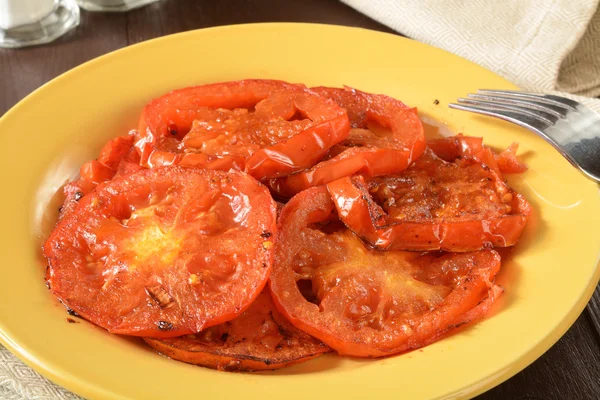 Plate of fried tomatoes — Stock Photo, Image