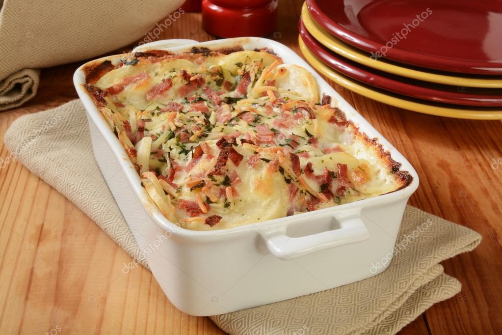 Scalloped potatoes in cheese sauce Stock Photo by ©MSPhotographic 71849905
