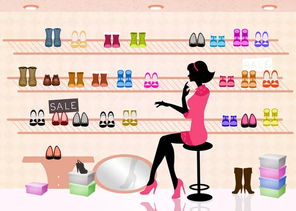 Vrouw in schoenen winkel — Stockfoto