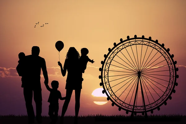 Family in amusement park — Stock Photo, Image