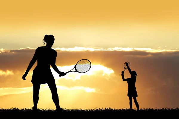 Chica jugando tenis al atardecer —  Fotos de Stock