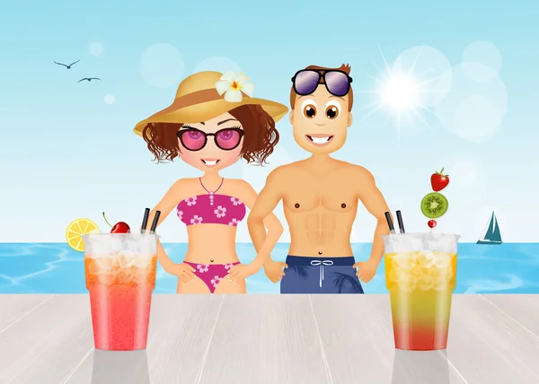 Kadın ve erkek plajda kokteyl içmek — Stok fotoğraf