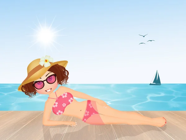 Girl sunbathing at the beach — Stock Photo, Image