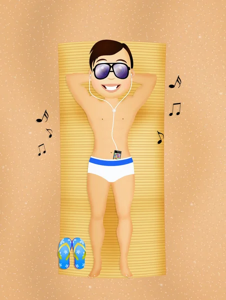 Man listens to music while sunbathing — Stock Photo, Image